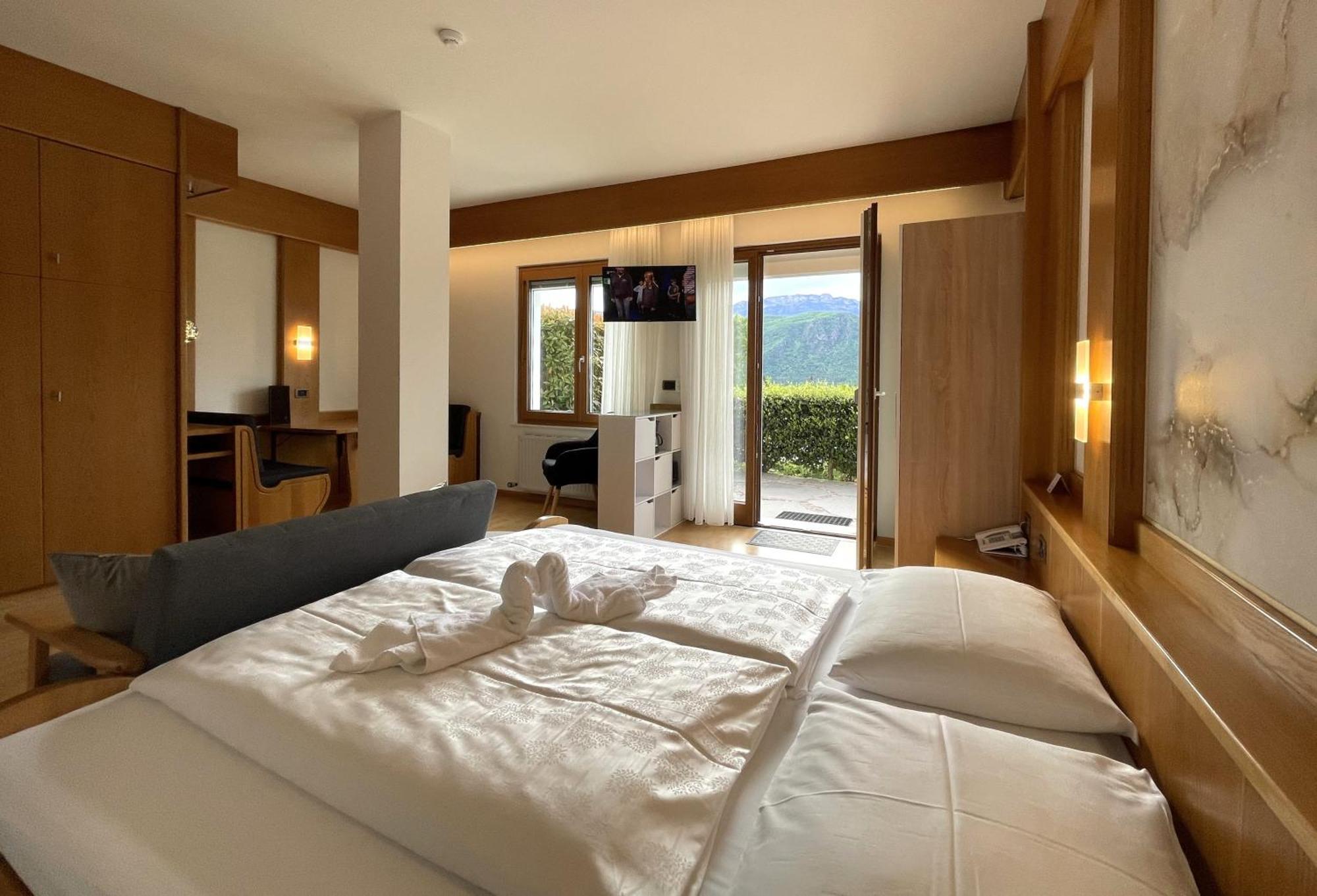 Hotel Garni Gruener Baum Laives Quarto foto